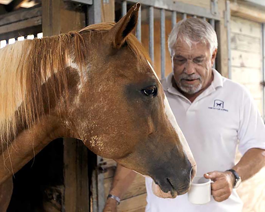 Jerry with with a horse and a coffee up